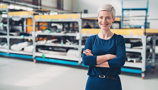 smiling woman in a factory