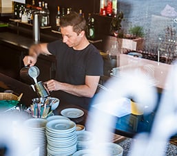 Barista making drink in a coffeeshop