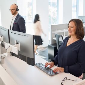 bdc employees working at their desks