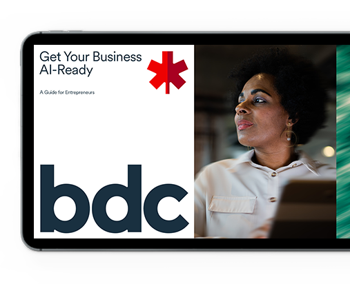 tablet showing the cover of BDC's artificial intelligence ebook