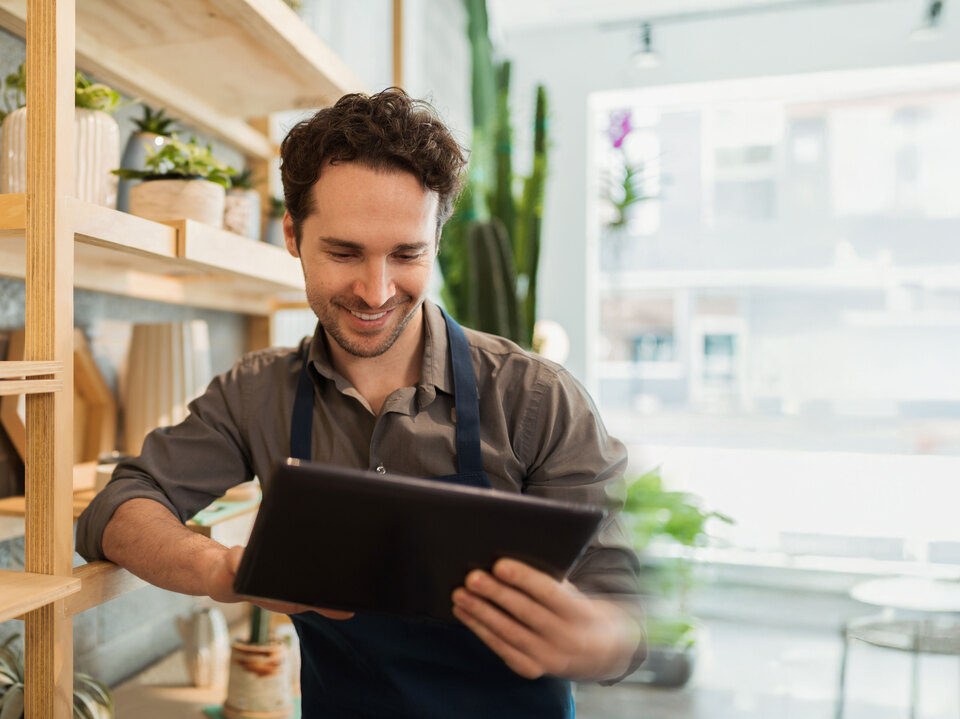 Man swiping finger on tablet