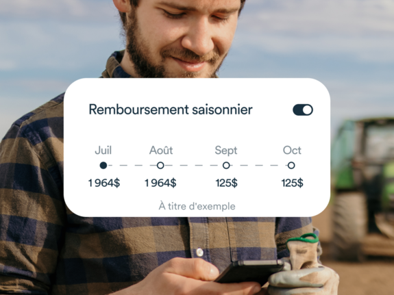 Un homme tenant un téléphone
