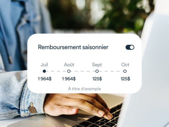 Un homme utilisant son ordinateur portable