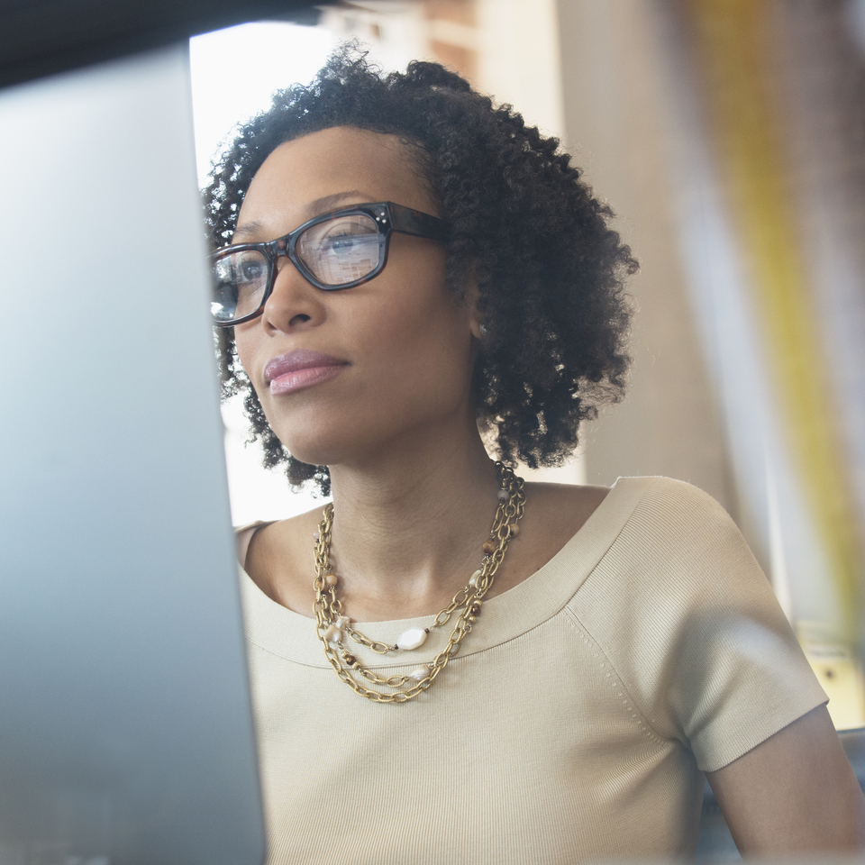 black businesswoman working at a computer